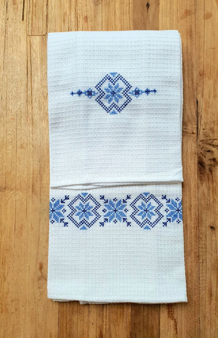 Kitchen towel with rustical ornament